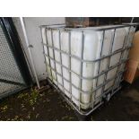 A 1,000 litre metal framed pallet based plastic bowser water tank, with tap.