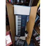 A Casio CT-420 ToneBank electric keyboard, partial boxed.