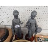 A pair of decorative Oriental figures of ladies in standing pose. (2, AF)