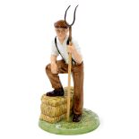 A Royal Doulton Classics Farmer figure, HN4487, (AF), 20cm high.