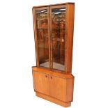 A teak corner display cabinet, with two glaze door top above two cupboard door base, 170cm high, 85c