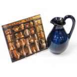 An Eltonware pottery jug, circa 1900, in a blue glazed decoration with Eltonware information book, 2