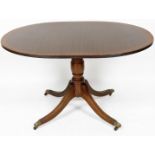 A reproduction mahogany pedestal oval dining table, on tripod base, 72cm high, 122cm wide, 84cm deep