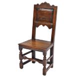 A late 17th/early 18thC oak side chair, the moulded back with clover type design on rectangular back
