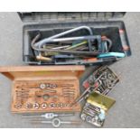 Various tap and die sets, and a plastic toolbox containing crowbar, saws, and other hand tools, etc.