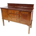 A late 19thC mahogany sideboard, with applied moulded top, above two cupboards and three drawers wit