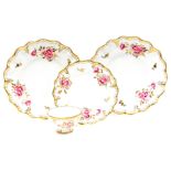 A group of Royal Crown Derby Royal Pinxton Rose pattern wares, to include a pair of large wall plate