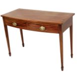 An early 19thC mahogany and cross banded side table, with applied brass handles, on square tapering