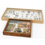 Two display cases, with contents of architectural finds, Military buttons, musket balls, etc. (2 cas