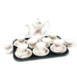 A Royal Albert Moss Rose part tea service, comprising tea pot, six cups and saucers and a milk jug.