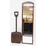 An oak framed mirror, and a wooden shovel. (2)