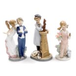 Three Lladro figures, to include a Bride and Groom no. 5555, 22cm high, a figure of a female and do