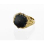 A 9ct gold and bloodstone gent's signet ring, shield set, with etched shoulders, ring size N½, 3.3g