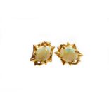 A pair of opal stud earrings, with oval opal in four claw setting, surrounded by abstract twist desi