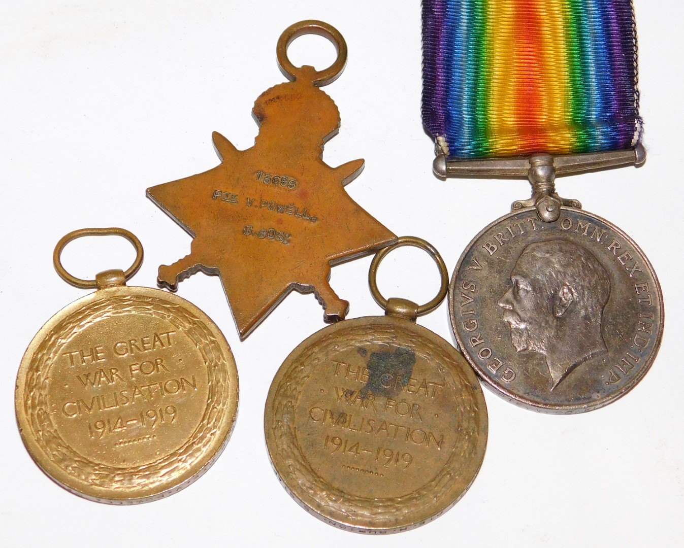 A set of WWI medals, named to Pte V Powell, Grenadier Guards, 13699, comprising 1914-15 star, Victor - Image 2 of 2