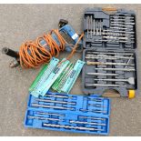 A Bosch 1181 hammer drill and two sets of heavy duty masonry drills and bits, and a selection of oth