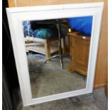 A cream painted rectangular wall mirror, 97cm x 73cm.