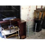 A group of assorted furniture, comprising a bookcase rotating CD rack, two tier trolley, coffee