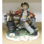 A Capodimonte Lory figure group of a seated gentleman with log burner, 29cm high, with Capodimonte