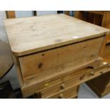 A pine box coffee table, the top with three panel top on block base, 37cm high, and the top 75cm x