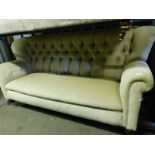 A Victorian style button back sofa, in a cream coloured upholstery, 105cm high, 190cm wide, 95cm