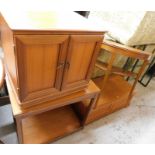 Four items of teak furniture, to include a D end table, a fold over two tier trolley, low cabinet