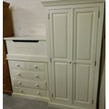 A cream painted pine bedroom suite, comprising two door wardrobe, 190cm high, 95cm wide, 57cm