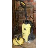 A Karcher K4 compact pressure washer.
