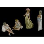 A collection of Nao porcelain figurines, to include two ballerinas, figure of a lady in a flowing dr