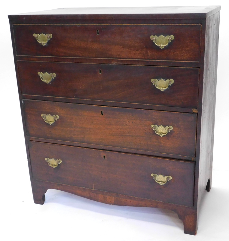 An early 19thC mahogany chest of drawers, with a crossbanded and ebony strung top, above four drawer