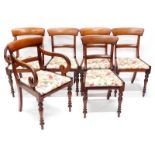 A set of six early Victorian mahogany dining chairs, each with a bar back, a drop in seat and turned