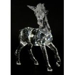 A Swarovski crystal model of a unicorn, 12cm high, in a fitted case.