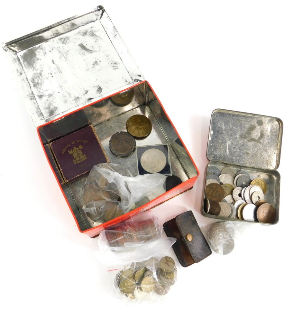 A large quantity of British and foreign coins, a German Kaiser medallion, etc.