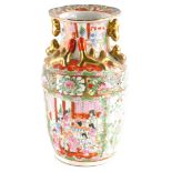 A Chinese porcelain Canton style vase, decorated with gilt handles, lizard figures, etc., an overall