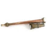 A copper and brass fireman's hose, with coupling attachment, 63cm long.