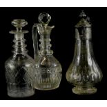 An engraved claret jug, with silver plated mount, 18cm high, a cut glass claret jug with stopper and