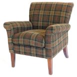 A mahogany armchair, upholstered in green and brown tartan fabric, on square tapering legs.