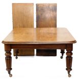An early Victorian mahogany extending dining table, the rectangular top with a moulded edge, on turn