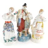 Two similar Russian porcelain figures, and a similar figure group. (3)