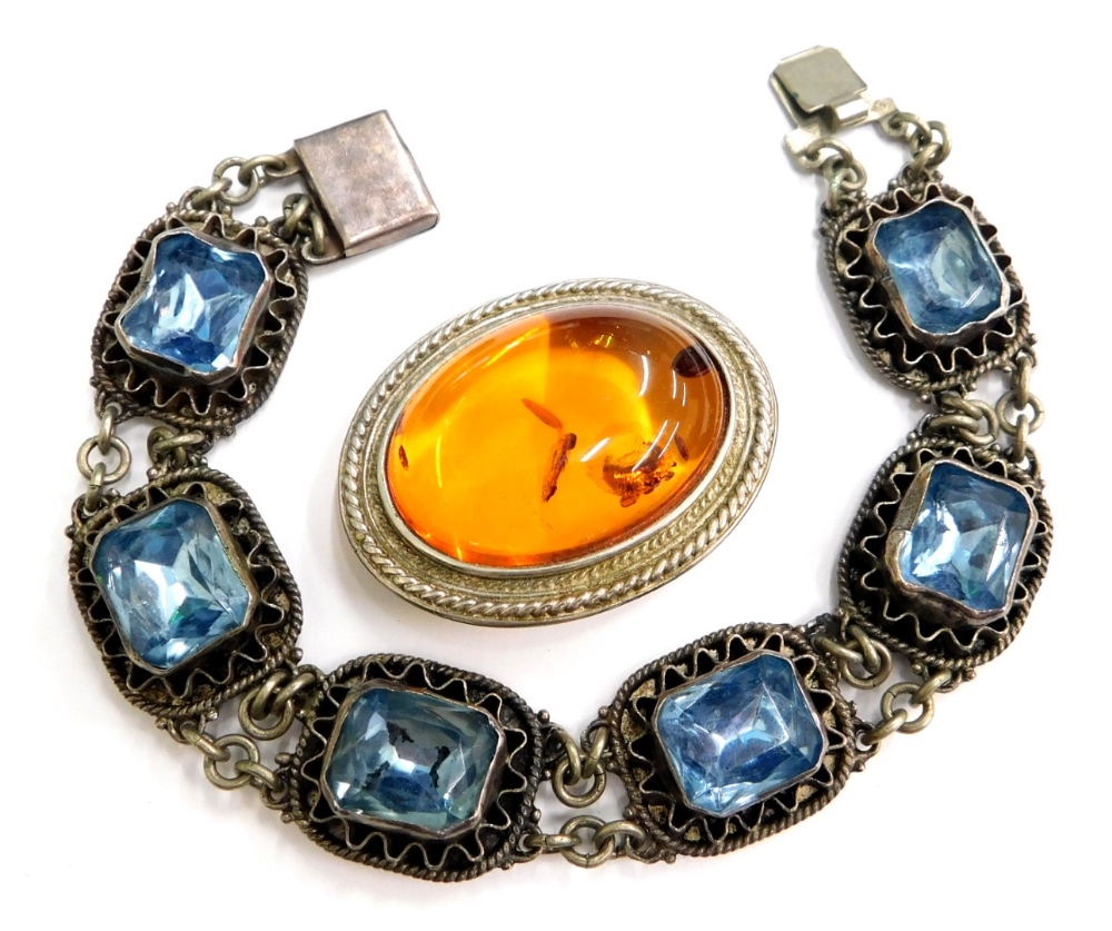 A group of silver and other jewellery, to include a blue paste stone set bracelet, in a white metal