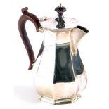 A George V silver coffee pot, with wooden knop and handle, Birmingham 1935, 16oz gross, 20cm high.