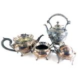 A quantity of silver plate, to include an embossed kettle on stand, etc.