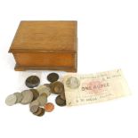 A quantity of foreign coins, to include a George V 1915 one rupee, etc.