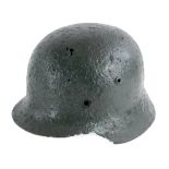 A German World War Two helmet, collected by the vendor in Normandy France.