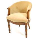 A Victorian walnut tub shaped chair, upholstered in beige fabric, with shaped arm supports, a serpen