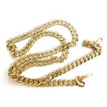 A curb link necklace, with heavy curb links and engraved decoration, yellow metal, marked 18k, 61cm