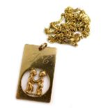 A group of 9ct gold jewellery, comprising a 9ct gold pendant with two figures in embrace, and a 9ct