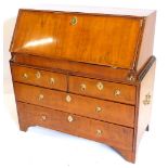 A mid 18thC walnut bureau, the feather banded fall enclosing a fitted interior, above two short and