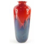 A Royal Doulton Sung flambe baluster vase, decorated in shades of blue green and red, printed marked