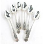 A set of six Georgian silver teaspoons, with bright cut engraved decoration and initialled WJS to th